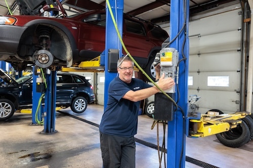 Mechanic working on a European Car in the shop