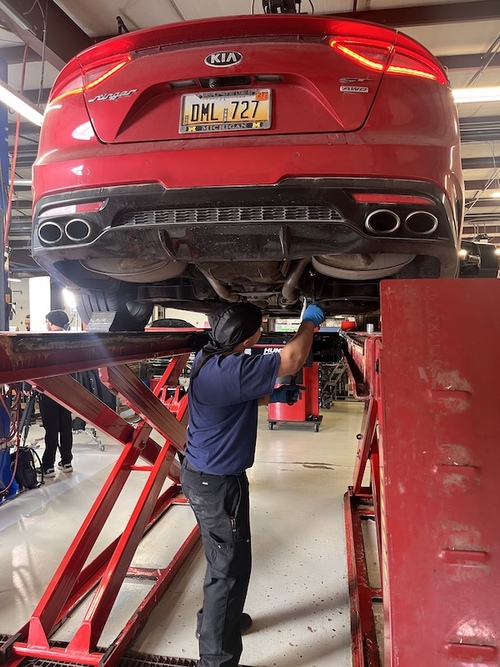 Alignment on a red Kia in the shop